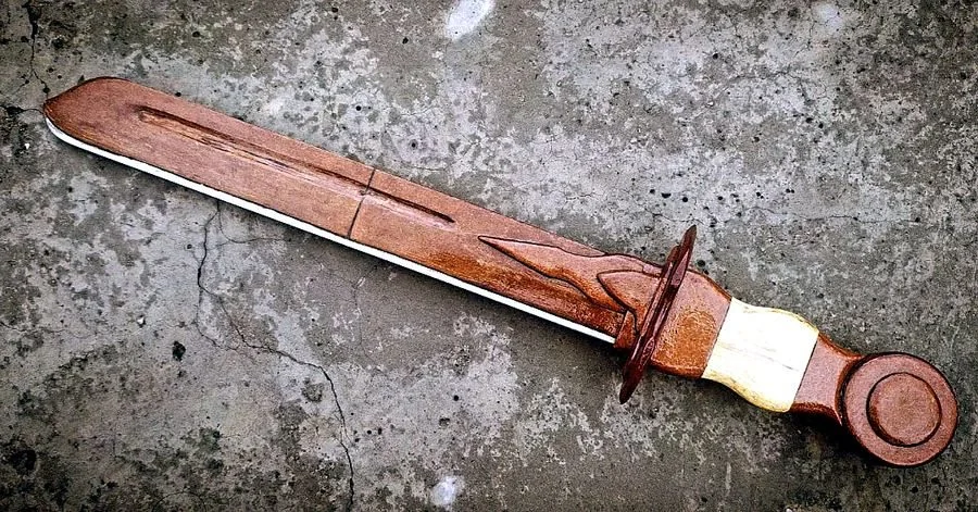 Carved miniature dagger