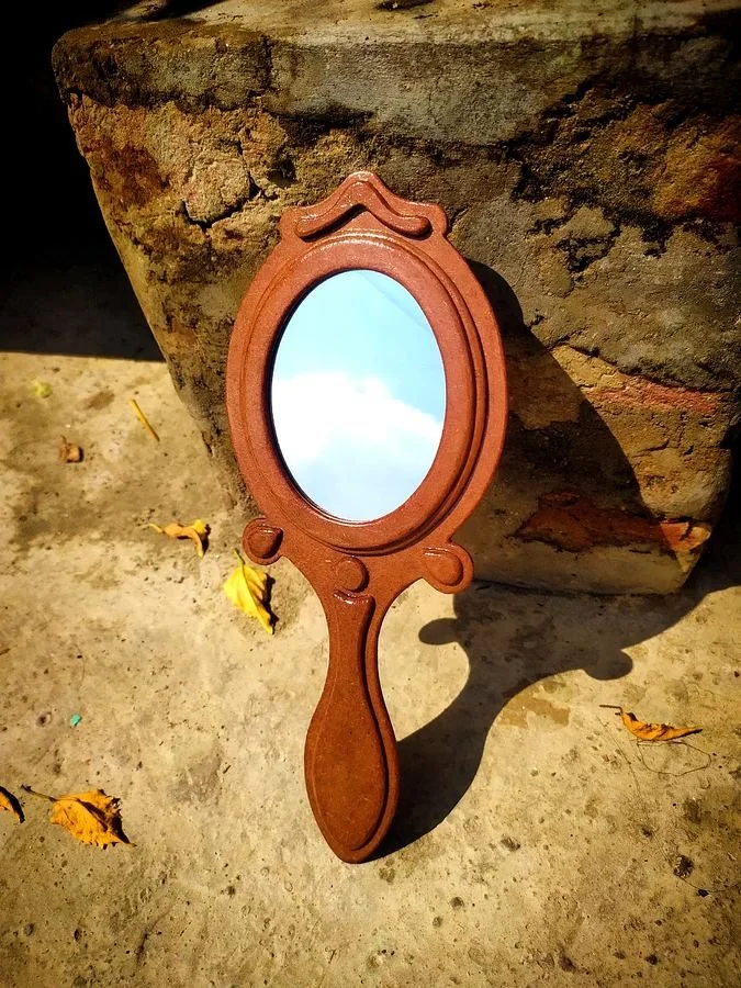 Hand mirror, sunlit